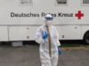 Rotkreuzschwester Bevölkerungsschutz in Schutzkleidung vor MMVE